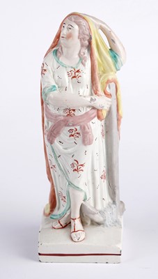 Lot 424 - Three Staffordshire figures