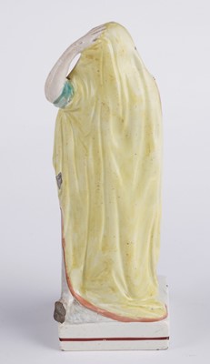 Lot 424 - Three Staffordshire figures