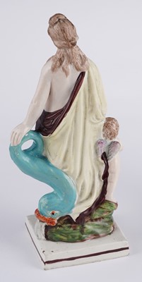 Lot 424 - Three Staffordshire figures