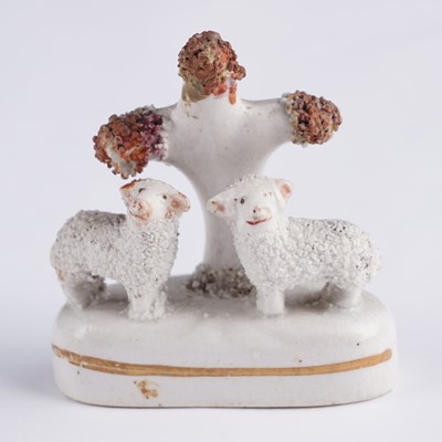 Lot 426 - Eleven Staffordshire poodles and sheep