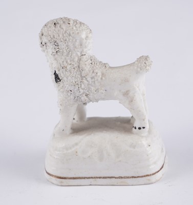 Lot 426 - Eleven Staffordshire poodles and sheep