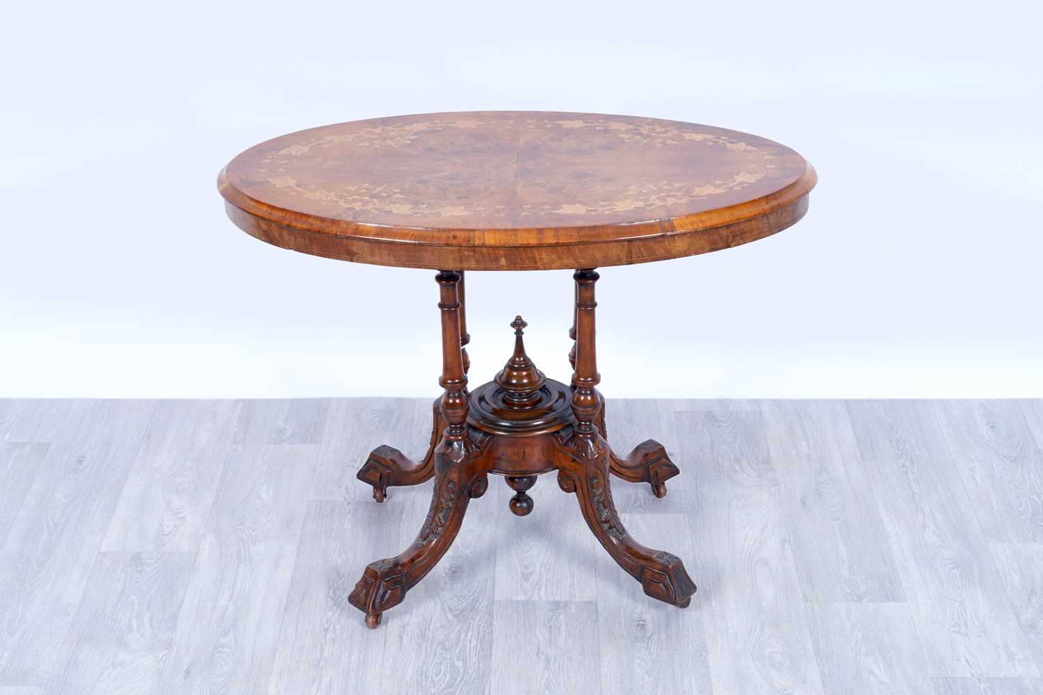 Lot 7 - A Victorian inlaid burr walnut and walnut occasional table