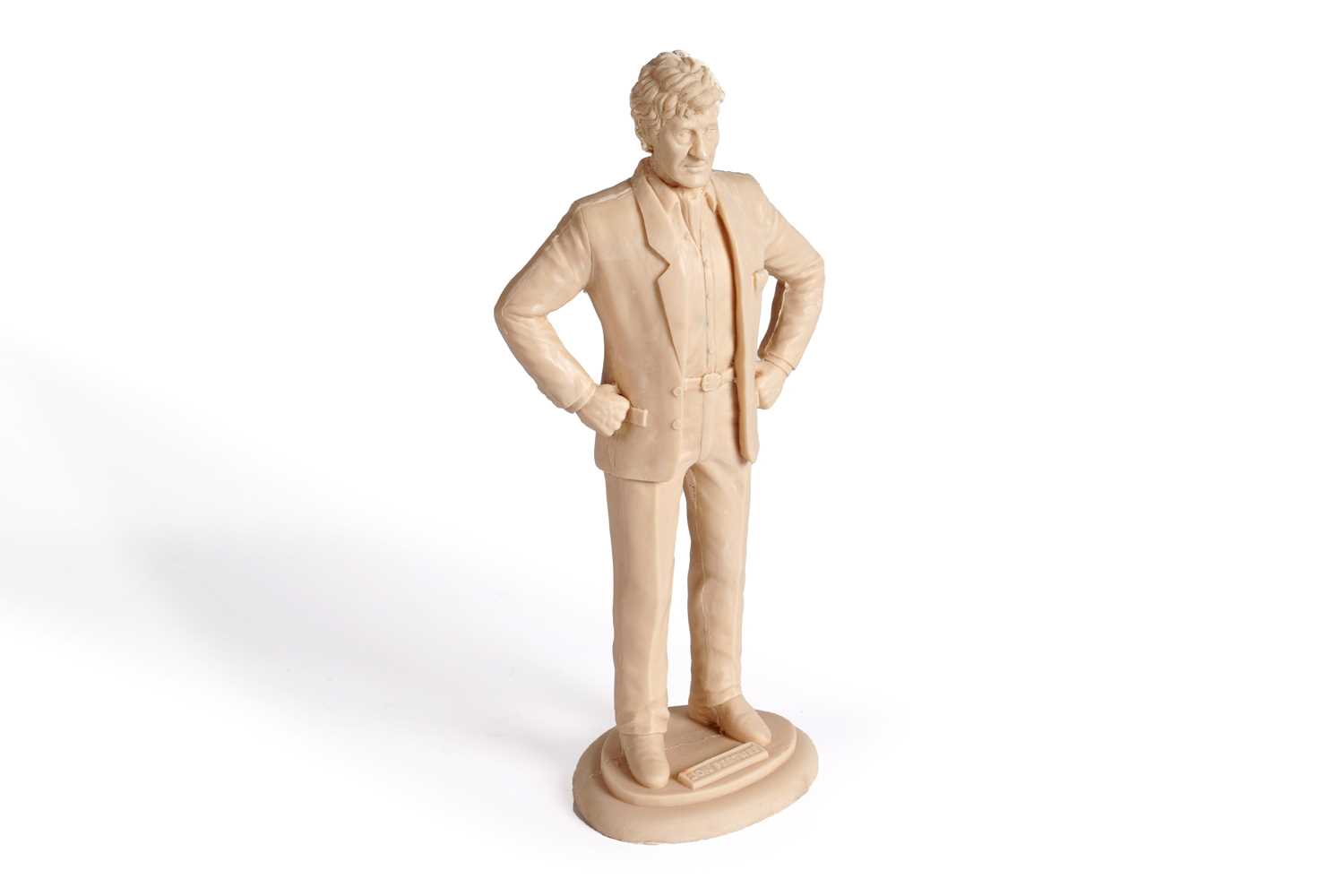 Lot 222 - A John Pertwee signed photograph, and cast statue