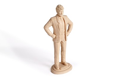 Lot 222 - A John Pertwee signed photograph, and cast statue