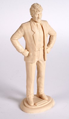 Lot 222 - A John Pertwee signed photograph, and cast statue