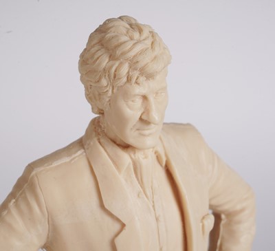 Lot 222 - A John Pertwee signed photograph, and cast statue