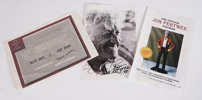 Lot 222 - A John Pertwee signed photograph, and cast statue