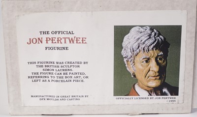 Lot 222 - A John Pertwee signed photograph, and cast statue