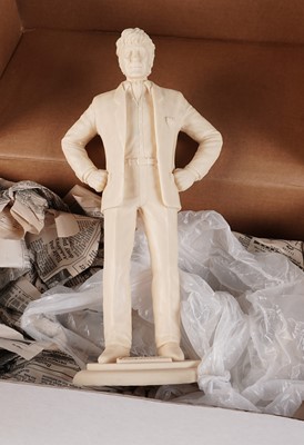 Lot 222 - A John Pertwee signed photograph, and cast statue