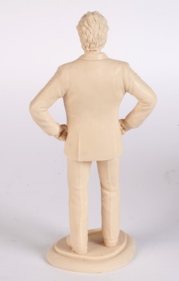 Lot 222 - A John Pertwee signed photograph, and cast statue