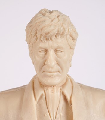 Lot 222 - A John Pertwee signed photograph, and cast statue