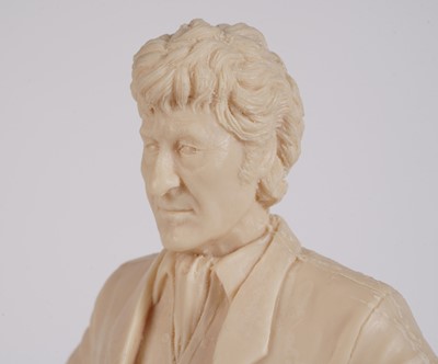 Lot 222 - A John Pertwee signed photograph, and cast statue