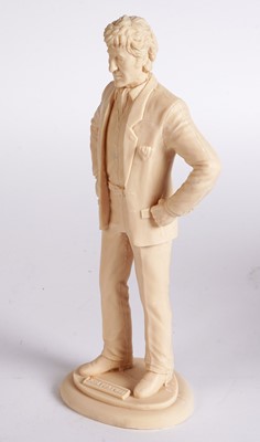 Lot 222 - A John Pertwee signed photograph, and cast statue