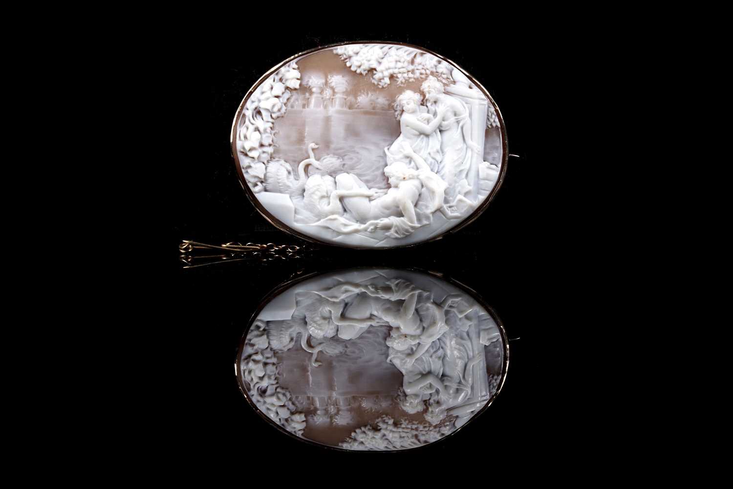 Lot 45 - A Victorian shell cameo brooch depicting a scene from the mythological story of Leda and the Swan