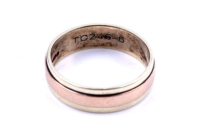 Lot 49 - A contemporary 9ct rose and yellow gold wedding band