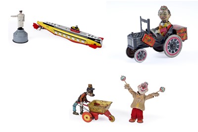 Lot 557 - An early 20th Century Marx tin plate ‘Joy Rider’ clockwork car; and other items