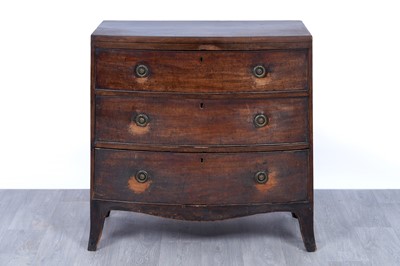 Lot 52 - A George III bowfront mahogany chest of drawers