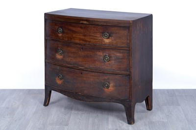Lot 52 - A George III bowfront mahogany chest of drawers