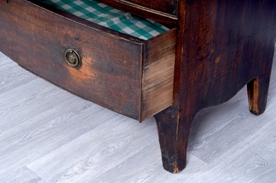 Lot 52 - A George III bowfront mahogany chest of drawers