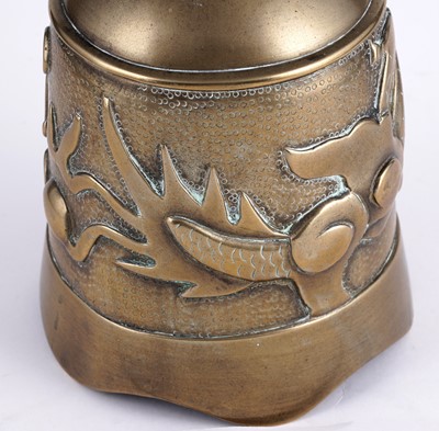 Lot 349 - A Chinese cast bronze bell and stand
