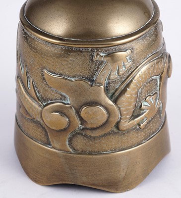 Lot 349 - A Chinese cast bronze bell and stand