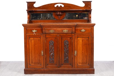 Lot 6 - An Arts and Crafts walnut sideboard
