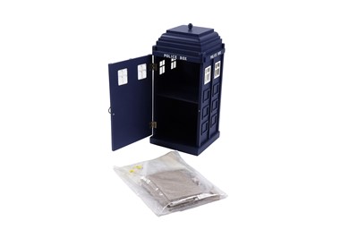 Lot 266 - A Doctor Who Tardis DVD cabinet; and other Tardis collectables