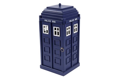 Lot 266 - A Doctor Who Tardis DVD cabinet; and other Tardis collectables