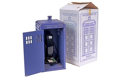 Lot 266 - A Doctor Who Tardis DVD cabinet; and other Tardis collectables