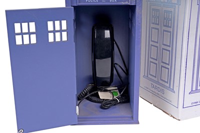 Lot 266 - A Doctor Who Tardis DVD cabinet; and other Tardis collectables