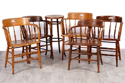 Lot 37 - Five early 20th-century oak captain's low-backed Windsor chairs