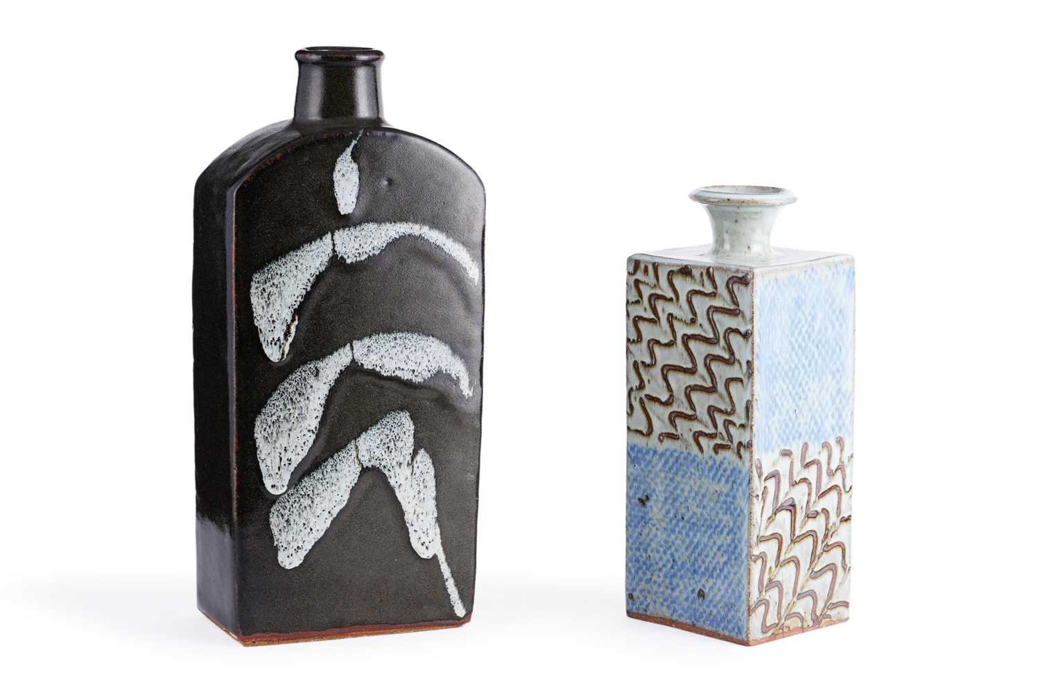 Lot 40 - Two studio pottery bottle vases