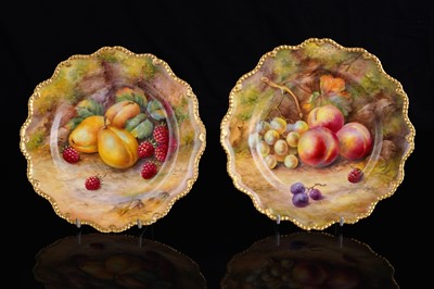 Lot 449 - A pair of Royal Worcester fruit-painted dessert plates