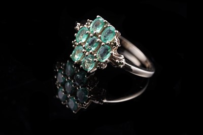 Lot 209 - A contemporary emerald ring