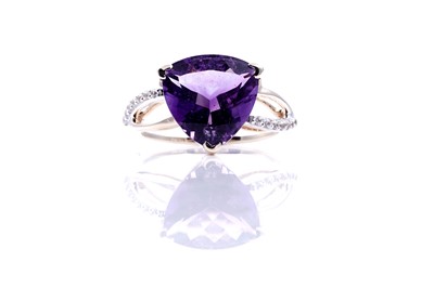 Lot 214 - A contemporary amethyst and diamond ring