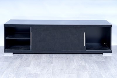 Lot 56 - A contemporary gloss-black and chrome-mounted TV cabinet