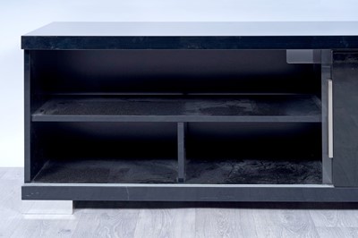 Lot 56 - A contemporary gloss-black and chrome-mounted TV cabinet