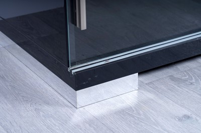 Lot 56 - A contemporary gloss-black and chrome-mounted TV cabinet