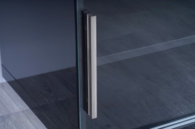 Lot 56 - A contemporary gloss-black and chrome-mounted TV cabinet