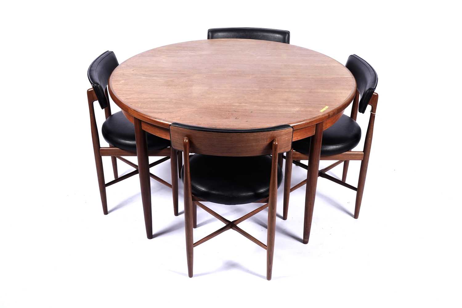 Lot 10 - G Plan ‘Fresco’: a teak circular extending dining table; and four chairs
