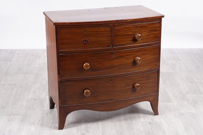 Lot 55 - A Victorian mahogany bowfront chest of two short over three long drawers