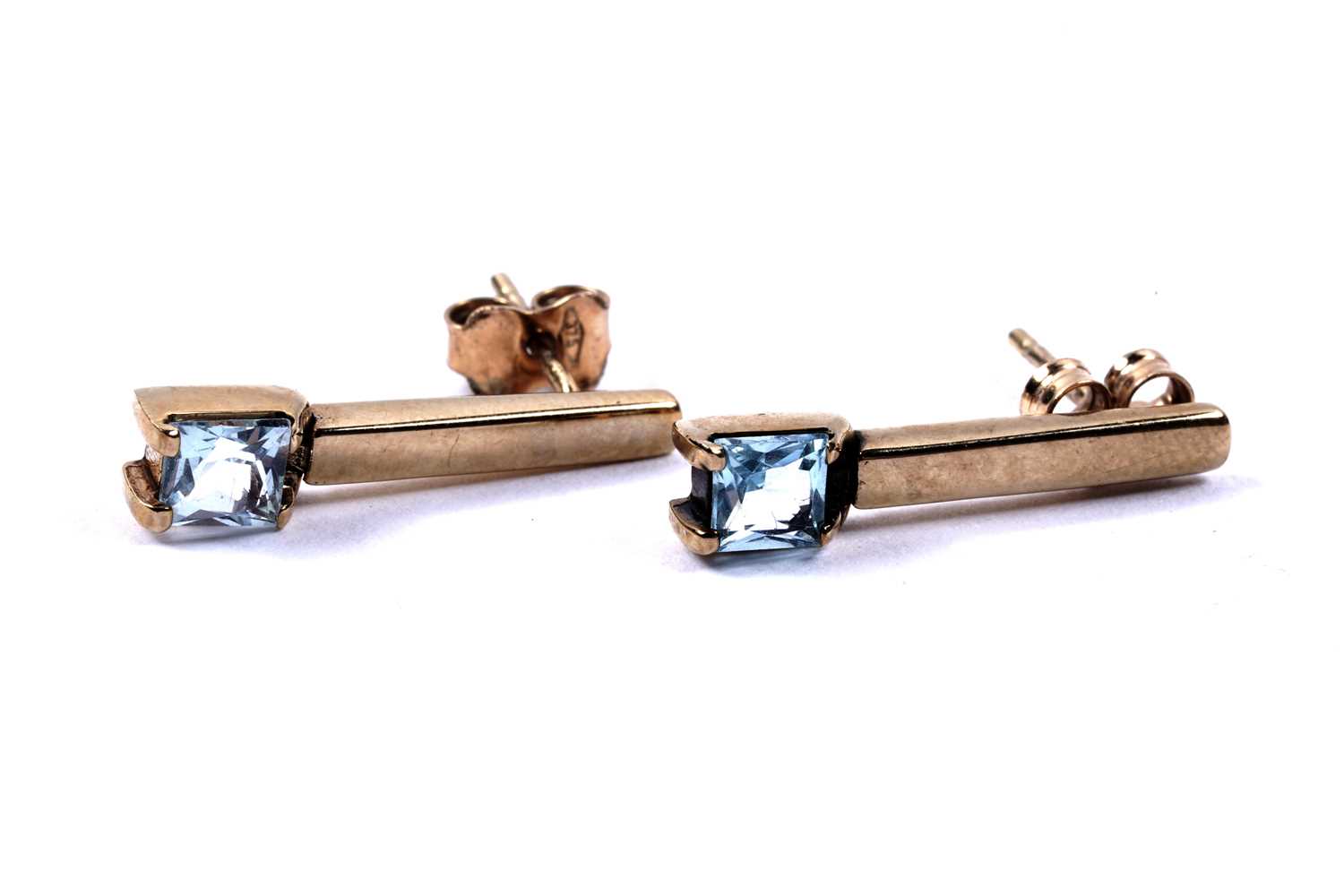 Lot 82 - A contemporary pair of topaz pendant earrings
