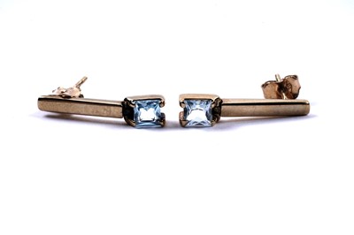 Lot 82 - A contemporary pair of topaz pendant earrings