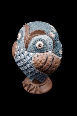 Lot 443 - A Doulton Lambeth Silicon-Ware owl jar and cover