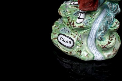 Lot 437 - A pair pearlware figures 'Elija' and 'Widow'