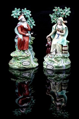 Lot 437 - A pair pearlware figures 'Elija' and 'Widow'