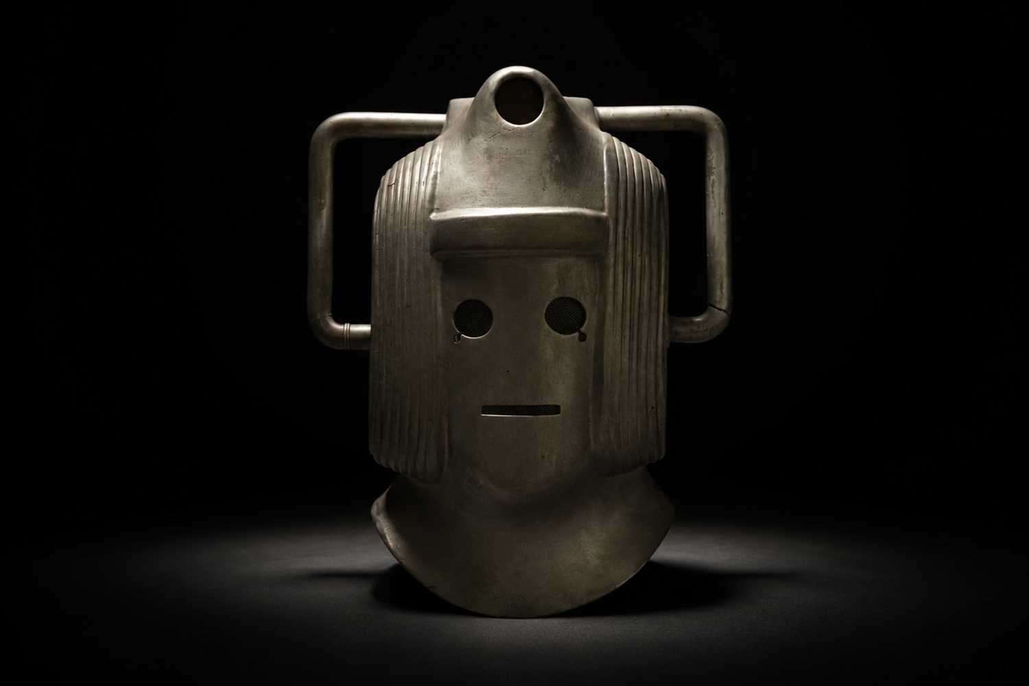 Lot 268 - A reproduction Cyberman helmet from 'The Invasion' 1968; and two other items