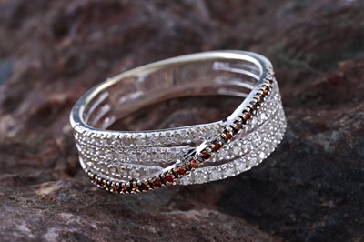 Lot 227 - A contemporary white and chocolate-brown diamond ring