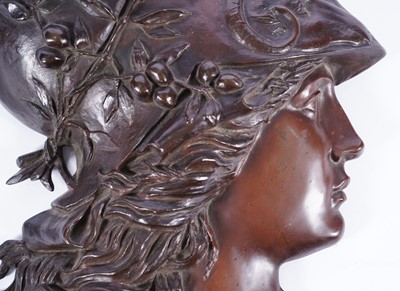 Lot 479 - After Emile Pinado, French (1840-1916): a substantial bronze profile portrait plaque of Minerva