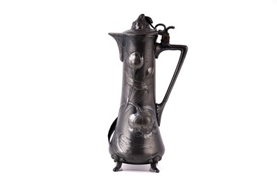 Lot 487 - WMF: an early 20th Century Art Nouveau pewter claret jug